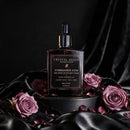 Actual Crystal Reign Forbidden Vow 50 mL fragrance oil bottle with mauve roses on black satin